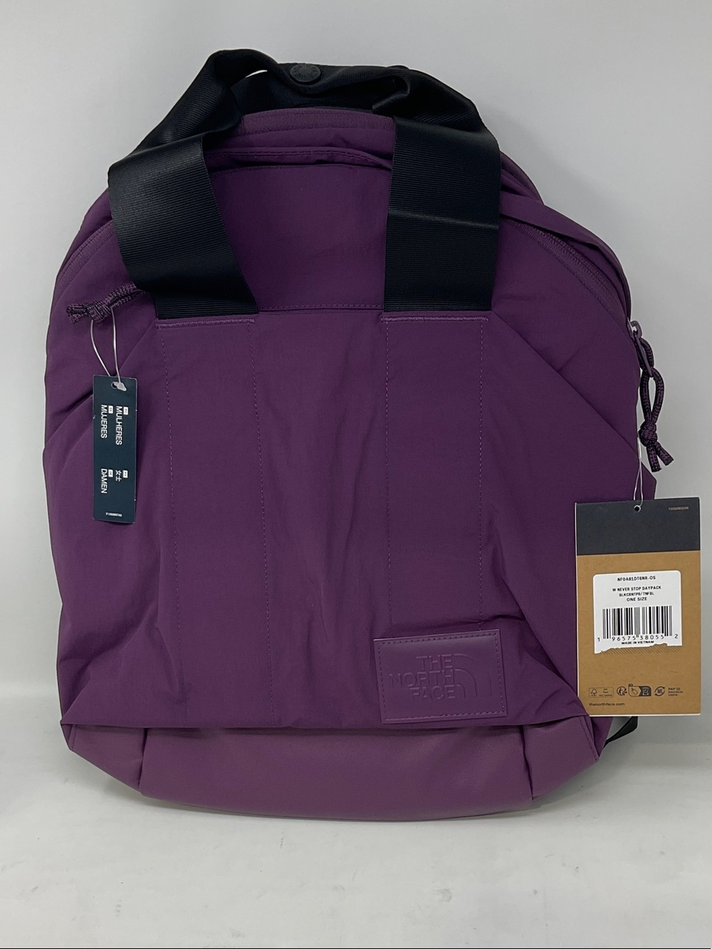 The North Face Purple Backpack with Top Handles and Zip Pockets